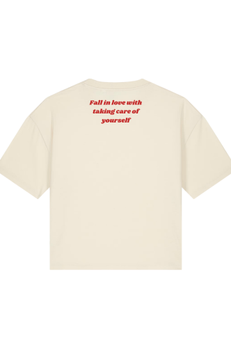 beżowa koszulka oversize damska z napisem Fall in love with taking care of yourself od She Vibes bawełniania